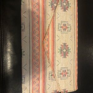 Textured aztec clutch